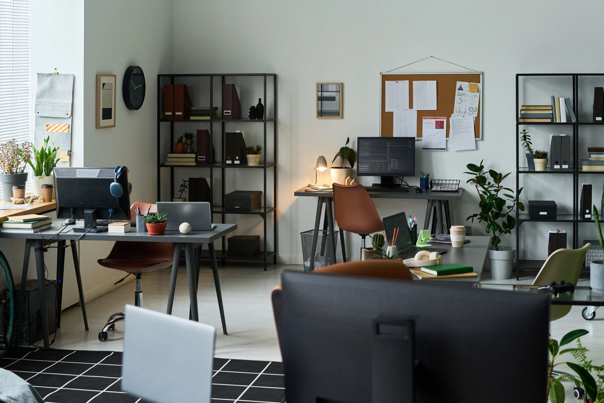 Open-plan newsroom-inspired office workspace